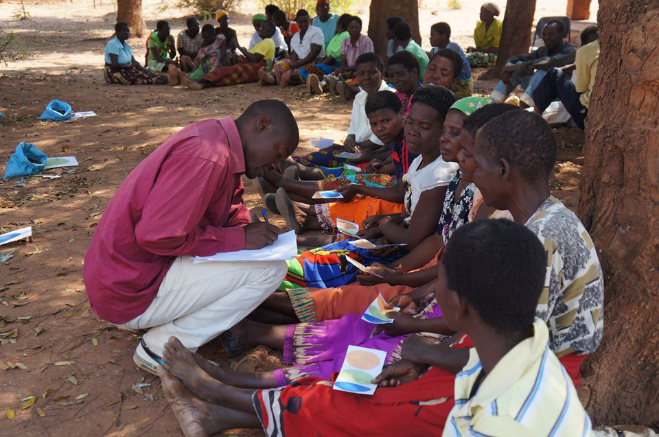 Malawian farmers and community members participating in a focus group on weed control for Tim Silberg's research